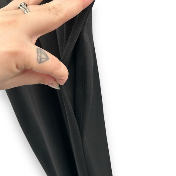 Calvin Klein Black Stretch jumpsuit Tie Neck Pockets Size 10 Wide Leg EUC - Picture 9 of 11